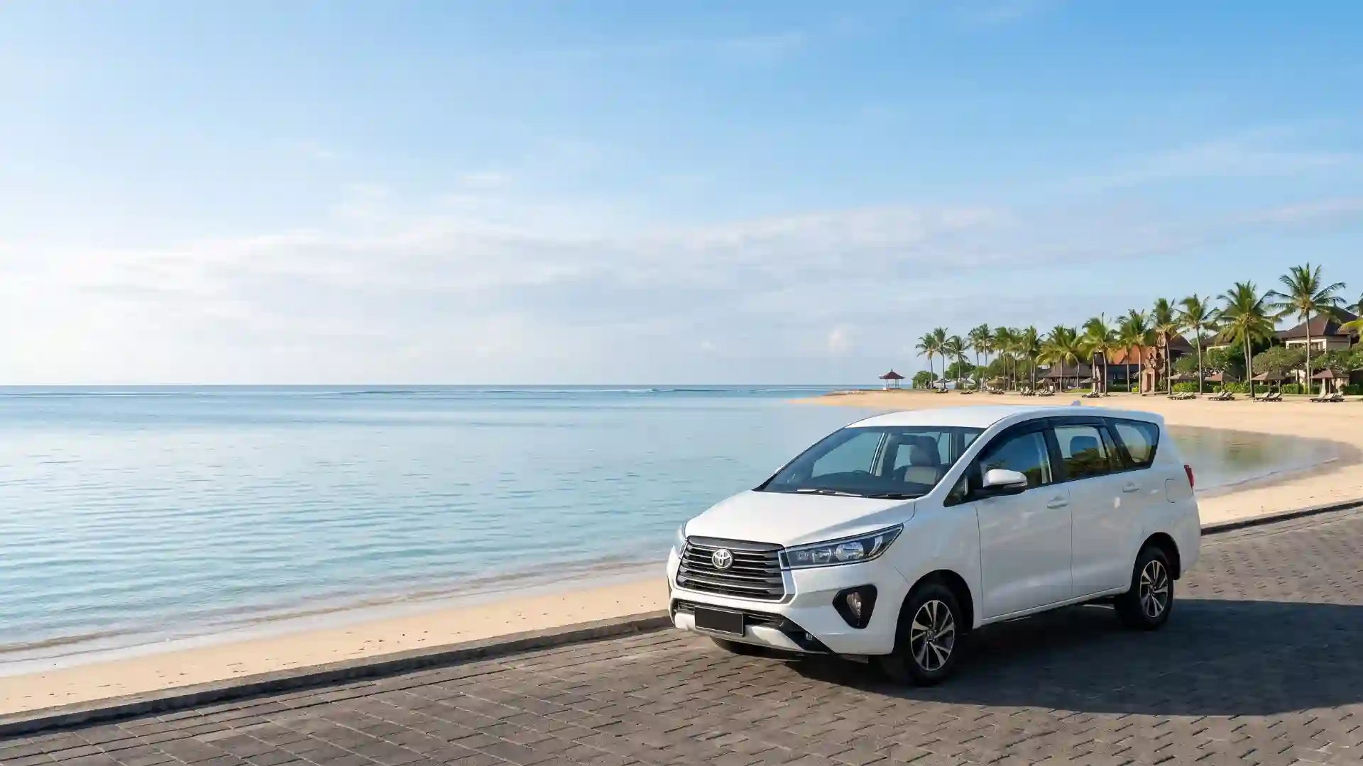 White private car parked beside a beach in Bali