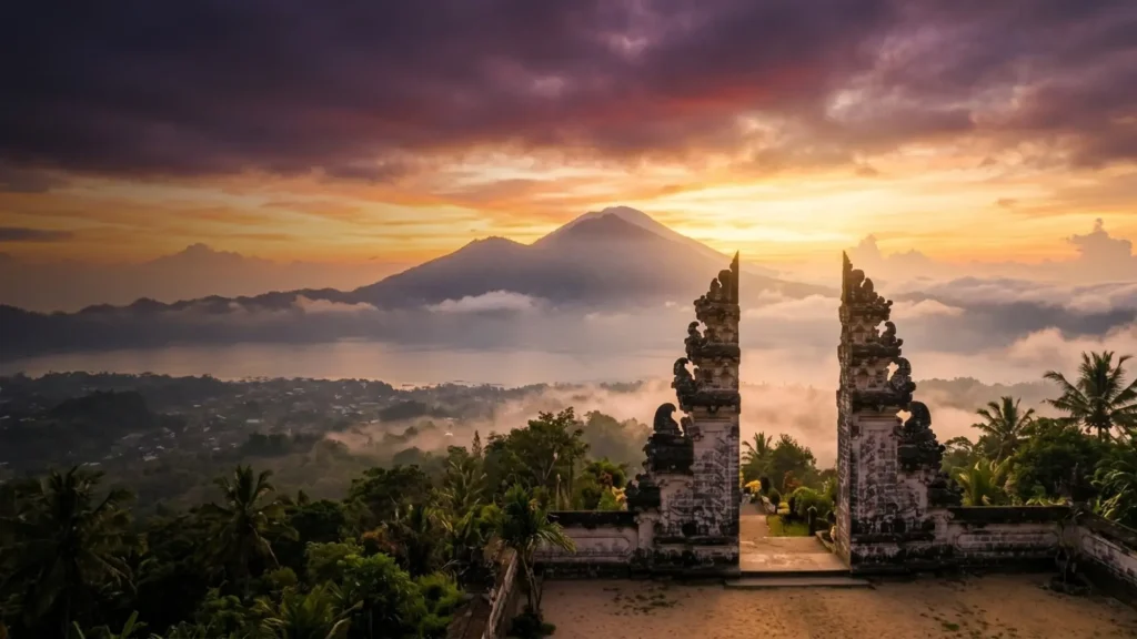 Balinese split gate with a volcano at sunrise